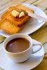 temps-de-petit-déjeuner-tasse-de-café-laiteux-de-biscottes-avec-du-beurre-et-de-confiture-4939...jpg